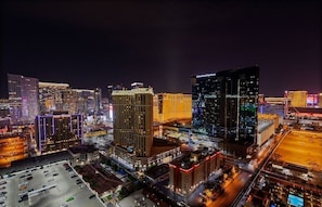 Experience the vibrant city atmosphere from the heart of this iconic hotel, situated amidst a bustling urban landscape.
