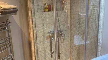 Shower, hair dryer, towels
