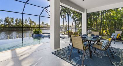 Villa Merrick - 4 bed/3.5 bath w/ heated pool/spa. Gulf access. Close to Cape Harbour!