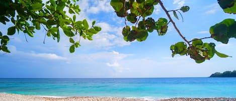On the beach, sun loungers, beach towels