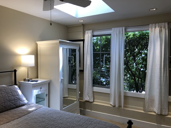 1 bedroom, desk, iron/ironing board, travel crib