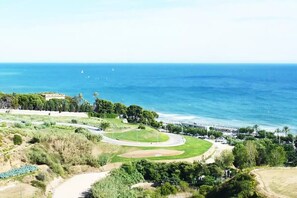 Na praia, toalhas de praia 