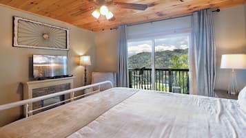 2 dormitorios, tabla de planchar con plancha, ropa de cama