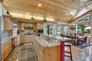 Fridge, microwave, oven, stovetop -  Indoor heated pool, spacious deck, seven rooms with beds, hot tub, and more! (South Lake Tahoe)