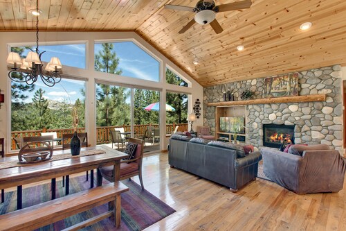  Indoor heated pool, spacious deck, seven rooms with beds, hot tub, and more!