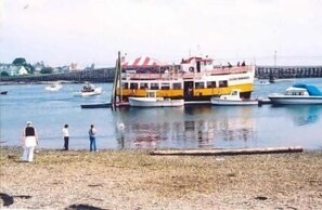 Board the ferry from this dock, where passengers can easily access the multi-deck vessel.
