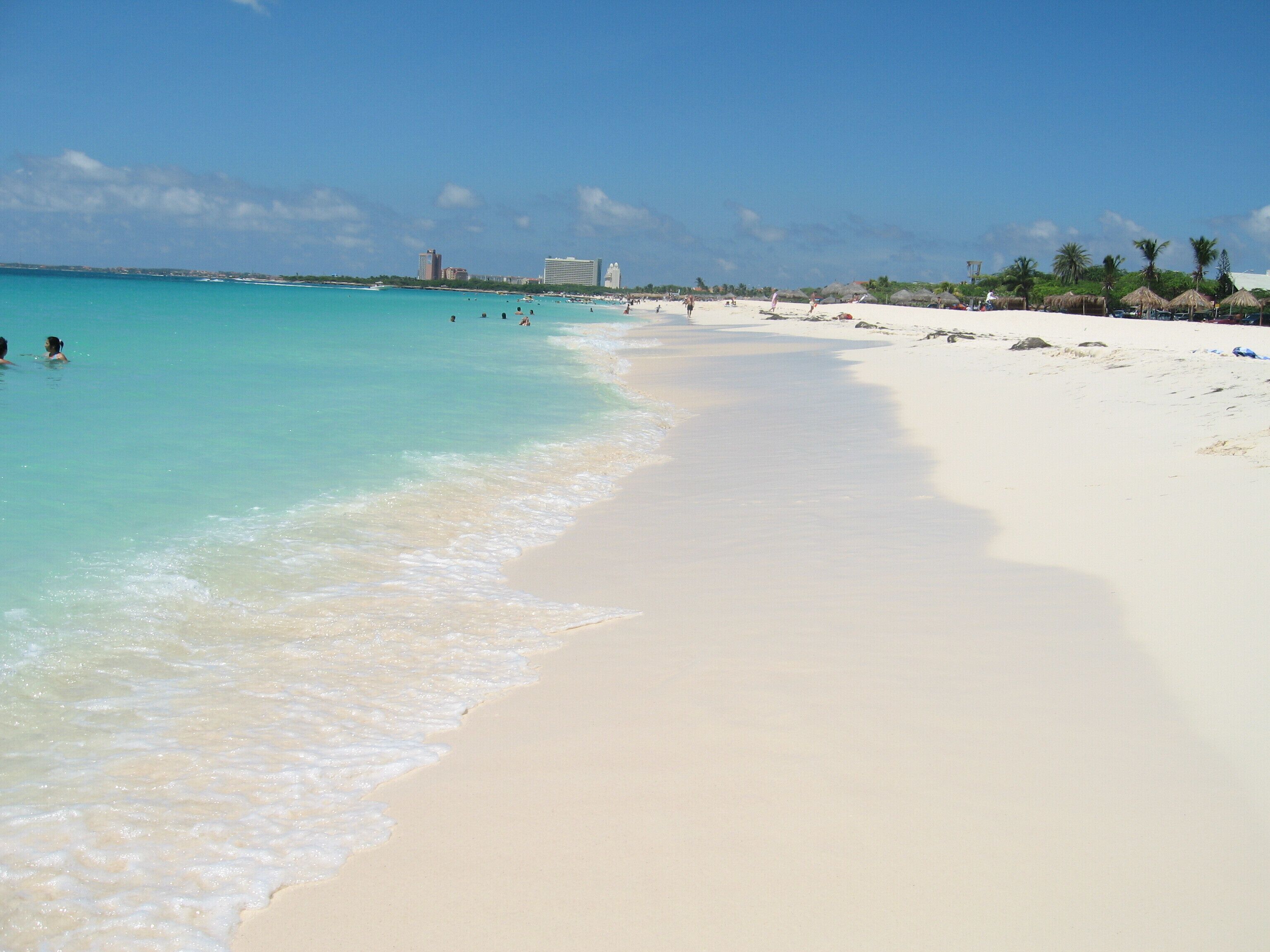 On the beach, sun loungers, beach towels