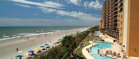 On the beach, sun loungers, beach towels