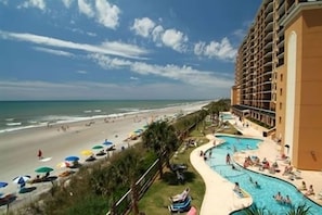 On the beach, sun loungers, beach towels