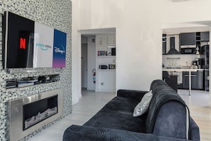 Smart TV, fireplace, DVD player, music library
