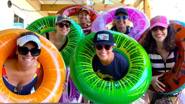 A group of people wearing inflatable rings. - Glass Treehouse W/ Views-EPIC POOL-Kayak-SUP-HIKES-Restaurants ,Airy Exotic vibe (Austin)
