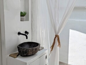 Combined shower/tub, hair dryer, towels, soap