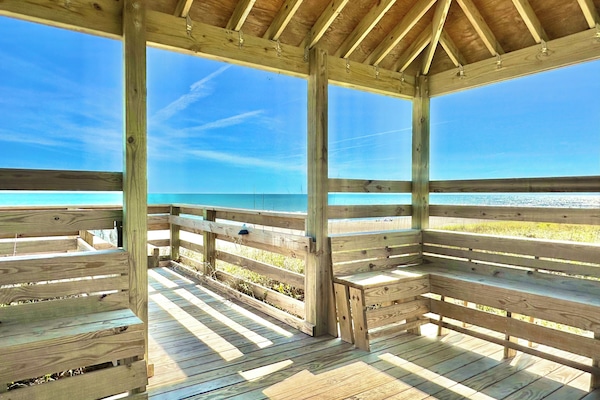 2 gazebos on property with seating.