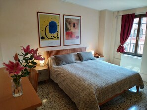 1 bedroom, desk, iron/ironing board, travel crib