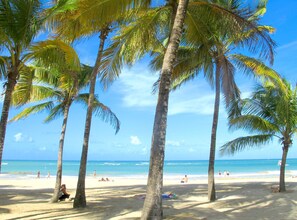 On the beach, beach umbrellas, beach towels