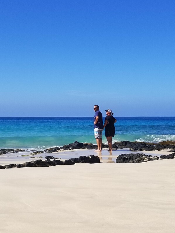 On the beach, sun loungers, beach towels
