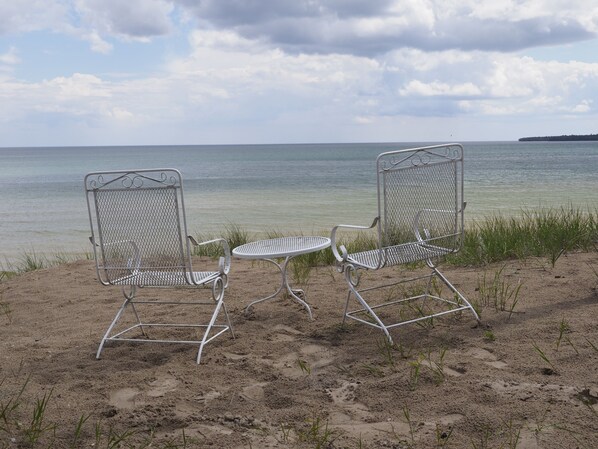 On the beach, sun-loungers, beach towels