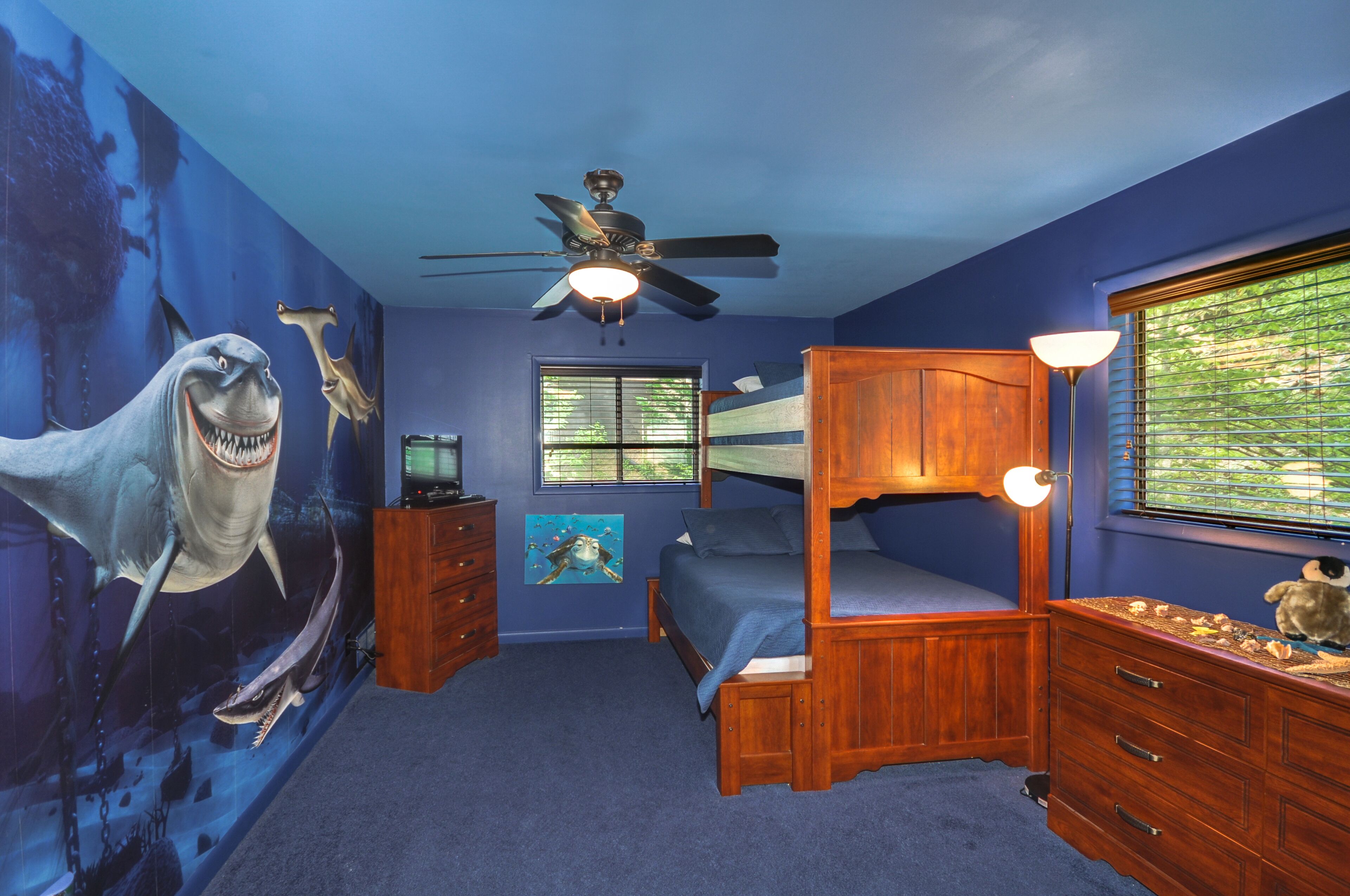 Bruce from "Finding Nemo" welcomes your children!  Tv and dvd player.