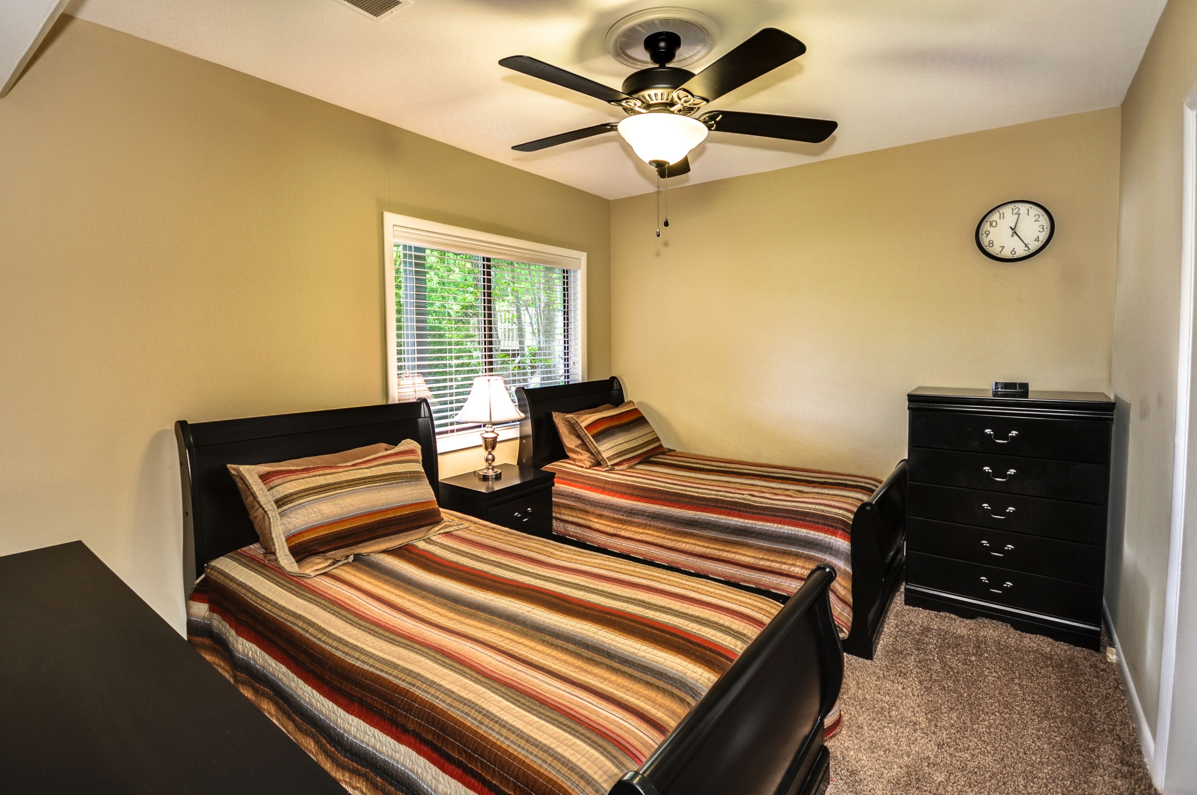 Lower level bedroom.  We have four bedrooms. Recently changed to a queen.