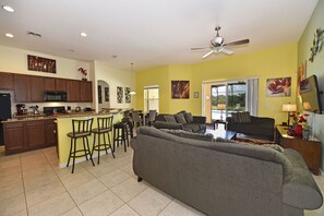 Flat-screen TV, DVD player, table football