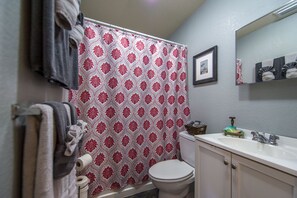 Combined shower/bathtub, hair dryer, towels, soap