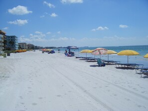 On the beach, sun-loungers, beach towels - Special Aug 08-29, 2026 - Madeira Direct Beach Front Corner Condo (Madeira Beach)