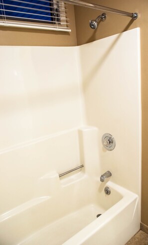 Combined shower/bathtub, hair dryer, towels, soap