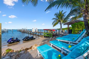 Private beach, sun loungers, beach umbrellas, beach towels - As Good as it Gets: 8BR/6BA, heated pool, hot tub, private dock, ocean-to-river (Stuart)