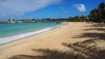 On the beach, sun-loungers, beach towels