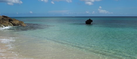 On the beach, sun-loungers, beach towels