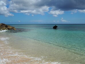On the beach, sun loungers, beach towels