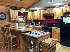 Fridge, microwave, oven, stovetop - 2 bedroom, 2 bath log cabin that is great for couples or a family. (Broken Bow)