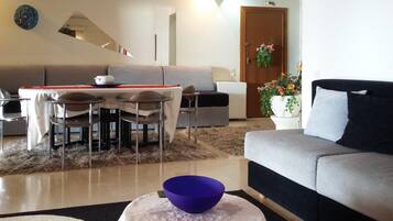 Apartment | Living area | Flat-screen TV, fireplace, DVD player