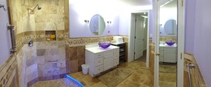 Shower, hair dryer, towels, soap