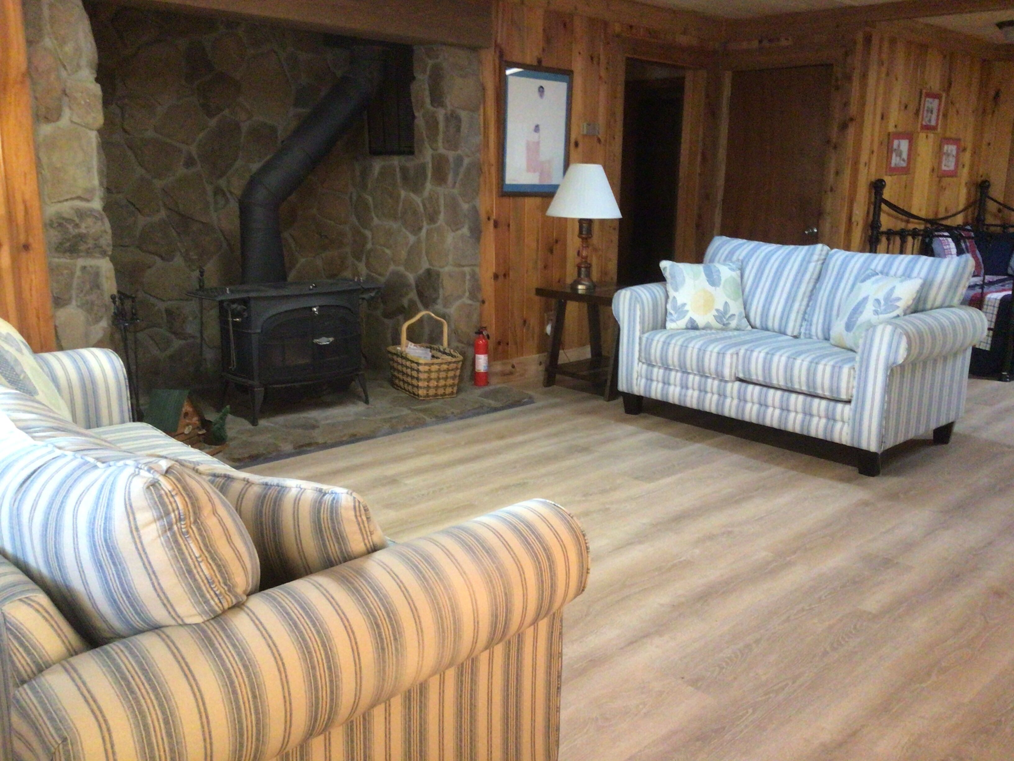 Downstairs family room, complete with wood stove 