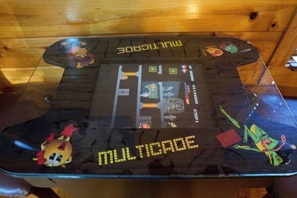 A game board with a 'MULTIPACE' title and cartoon characters.