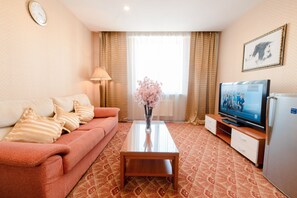 Chambre Deluxe | Coin séjour