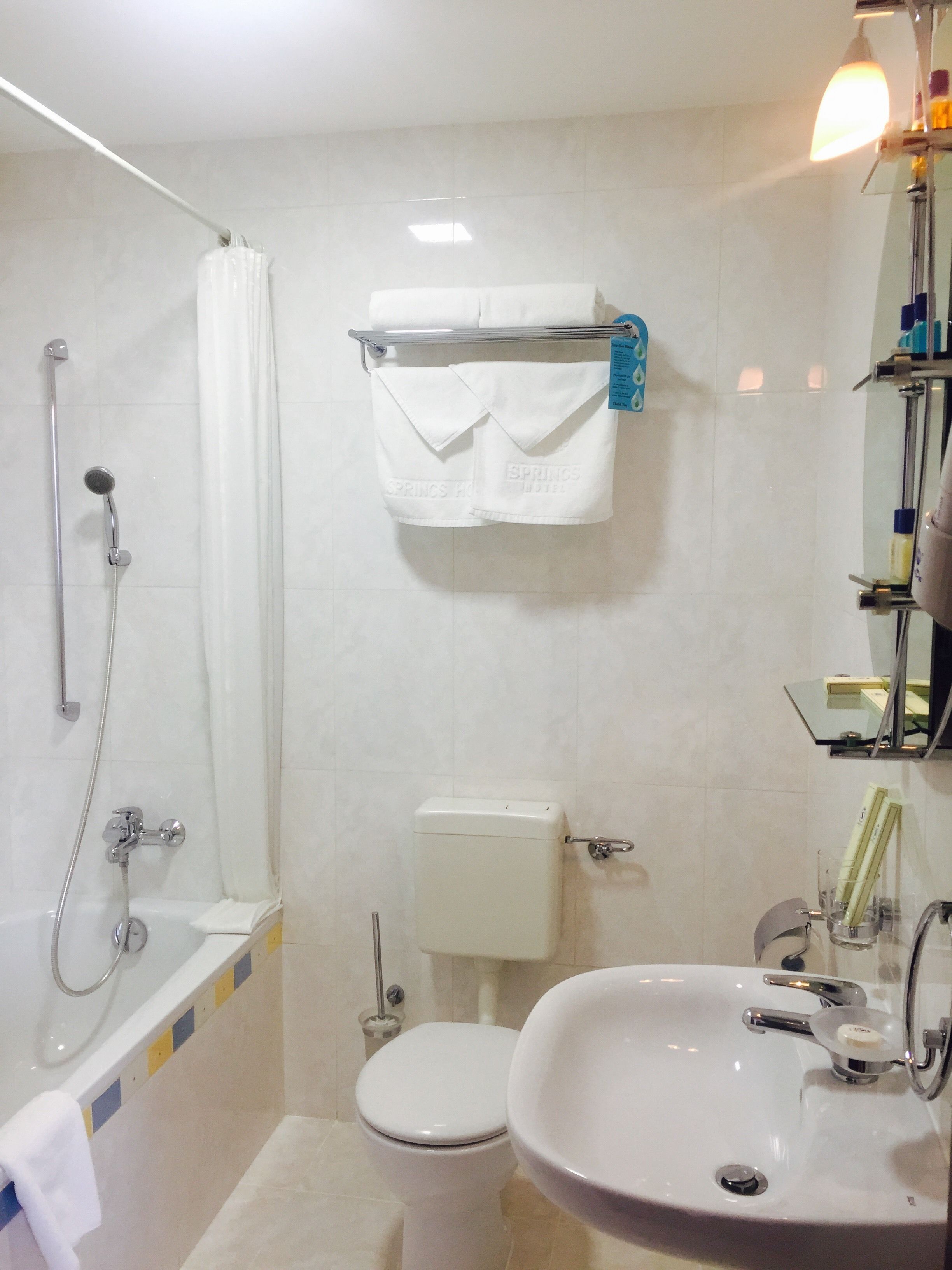combined shower/bathtub, free toiletries, hair dryer, bathrobes