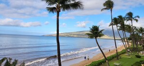 On the beach, sun-loungers, beach towels