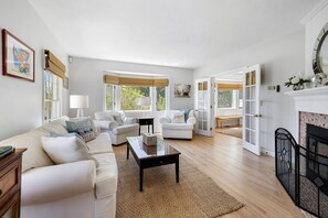 Smart TV, fireplace, books