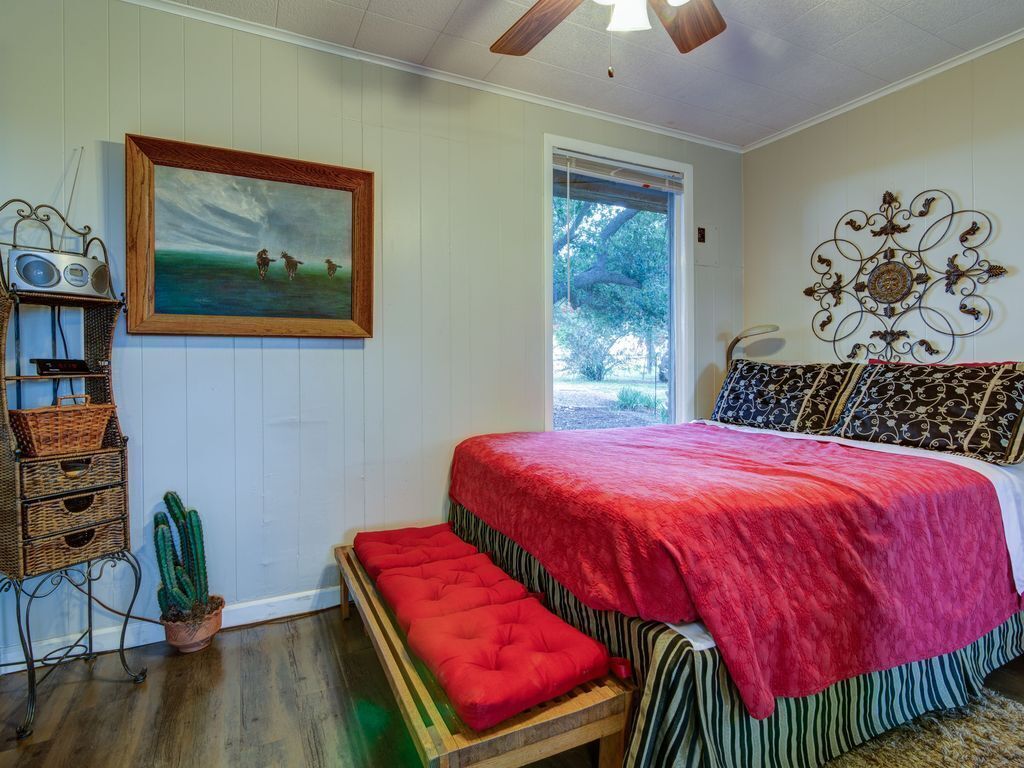 1 bedroom, desk, iron/ironing board, travel crib