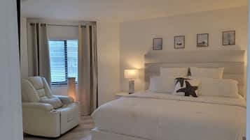 2 habitaciones, tabla de planchar con plancha y cuna de viaje