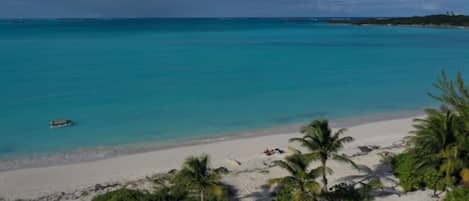 On the beach, sun-loungers, beach towels