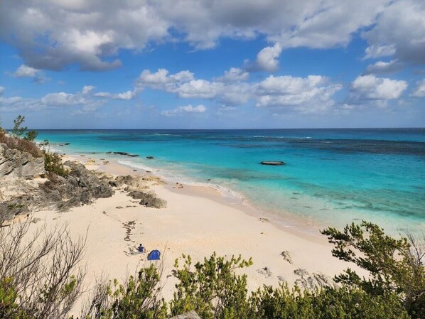 On the beach, sun-loungers, beach towels