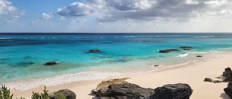 On the beach, sun-loungers, beach towels