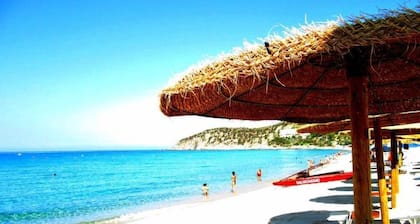 Appartement confortable avec terrasse privée prÚs de la mer, prÚs de Villasimiu