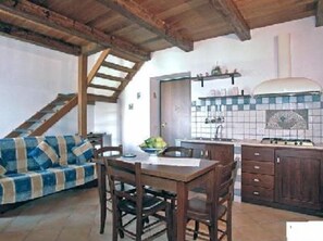 Step up to a multi-level retreat with a dining area and kitchen facilities.