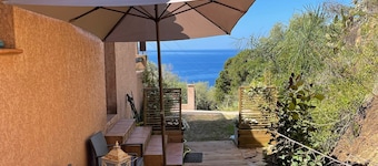 House with large terrace, garden  and spectacular sea view. Very quite area.