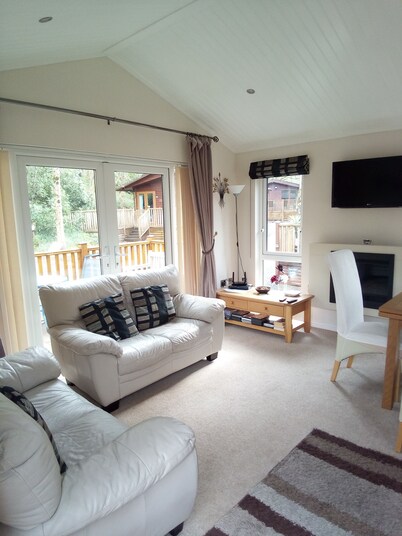 Log Cabin On Shores Of Lake Windermere, Surrounded By Breathtaking Scenery