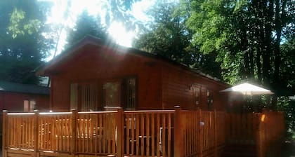 Log Cabin On Shores Of Lake Windermere, Surrounded By Breathtaking Scenery